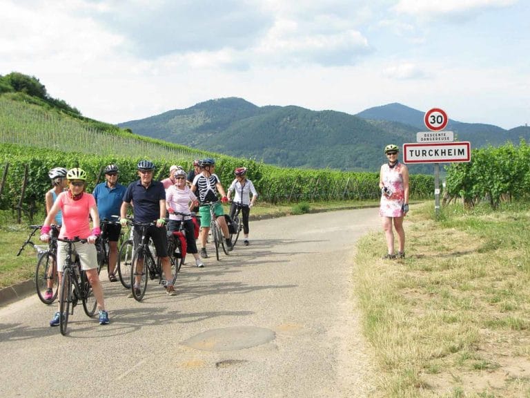 Cyclists in Turckheim on cycling holiday